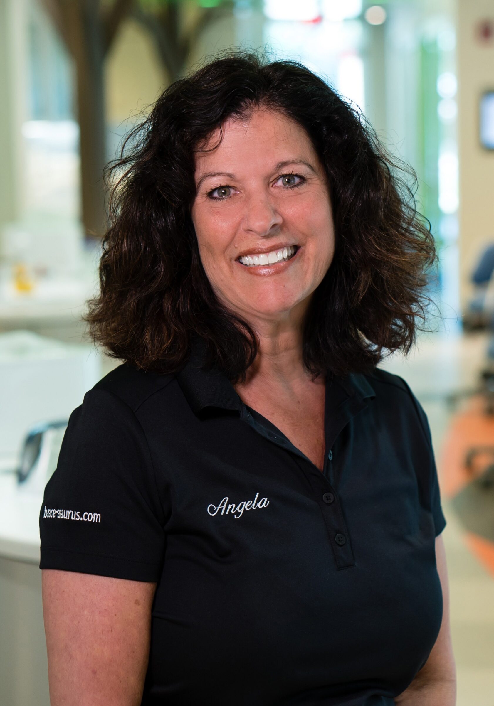 2025-11-05_Elm Tree_Editing out previous logo from headshots_Angela_CG 2025-11-05_Elm Tree_Editing out previous logo from headshots_Angela_CG